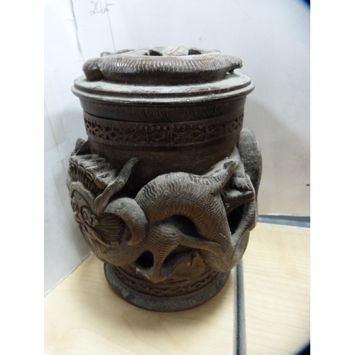 231 - Tribal-style figure, Great Yarmouth Pottery tankards, and an oriental-style tobacco jar.  (4)