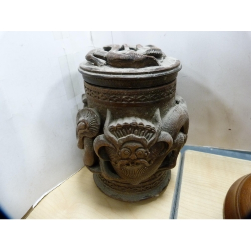 231 - Tribal-style figure, Great Yarmouth Pottery tankards, and an oriental-style tobacco jar.  (4)