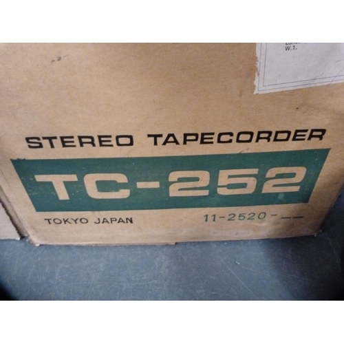 234 - Two cartons containing media accessories to include a Sony stereo tape recorder TC-252, recording ta... 