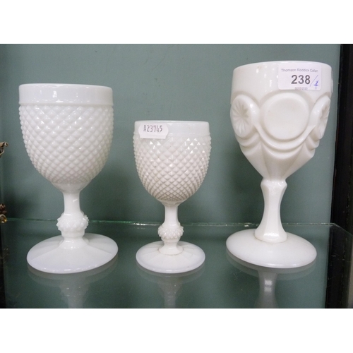 238 - Two near-matching Victorian opaque graduated goblets and another, similar, also a Capo di Monte grou... 