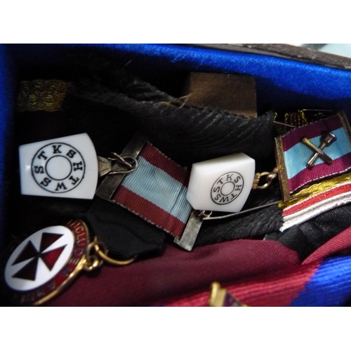 244 - Group of Masonic regalia to include apron, sashes, ties, badges and ephemera.