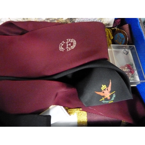 244 - Group of Masonic regalia to include apron, sashes, ties, badges and ephemera.