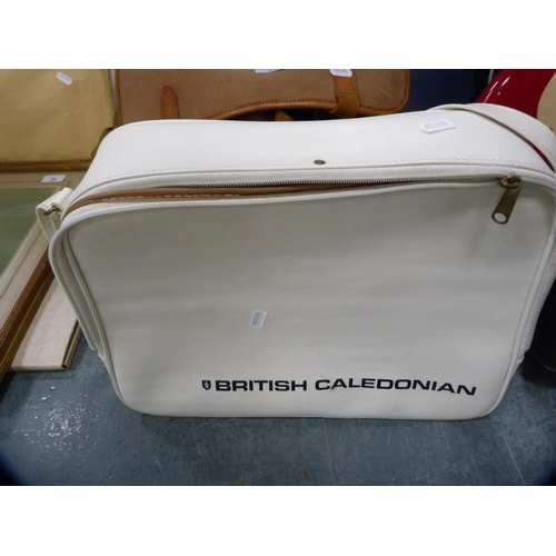 25 - Collection of fishing bags, tackle, fishing rod etc., and a British Caledonian flight bag.