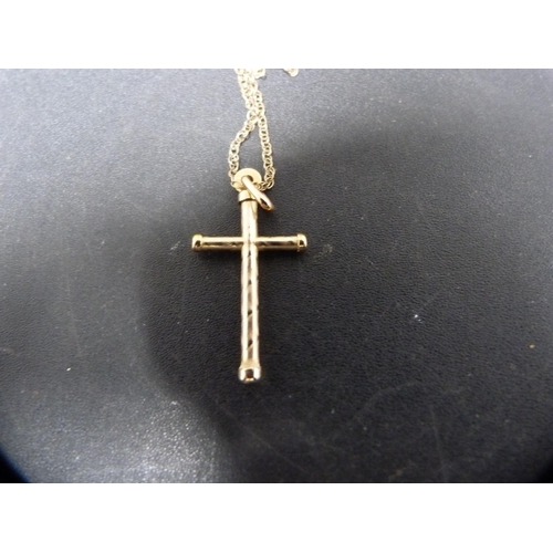 255 - 9ct gold cross pendant on chain, 1.7g gross, and another pendant on 9ct chain.