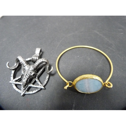 266 - Costume jewellery to include bangle, rings, zodiac brooch with ram's head, chain, lady's watch movem... 