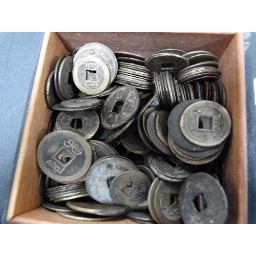 286 - Large quantity of eastern metal gaming tokens and an oriental coin converted to a brooch.