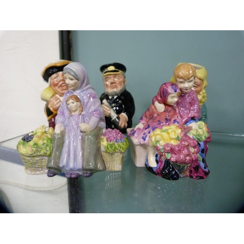 298 - Two Royal Doulton figure groups, 'Flower Sellers Children' and 'Granny's Heritage' from the Miniatur... 