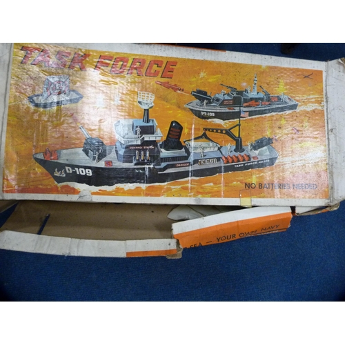 309 - Carton containing games and toys to include boxed Destroyer by Task Force, Airfix, boxed Buccaneer b... 