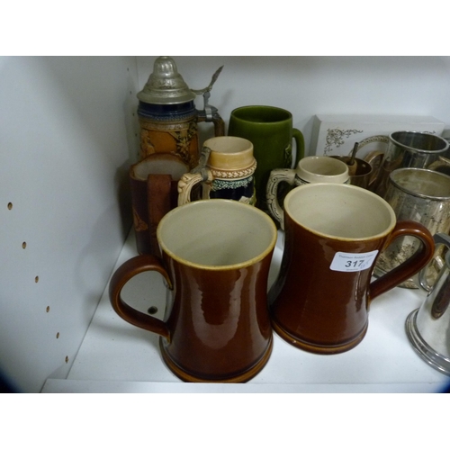 317 - Quantity of ceramic and plated tankards, and a part Grosvenor tea set (one shelf).