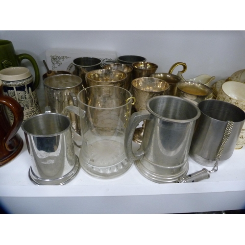 317 - Quantity of ceramic and plated tankards, and a part Grosvenor tea set (one shelf).