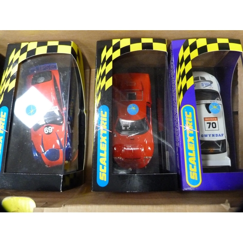 32 - Collection of Scalextric items including cars, track, controllers etc.