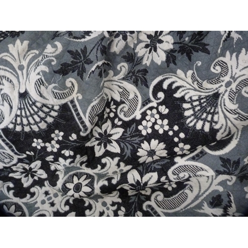 33 - Large black and grey wall hanging and other textiles.