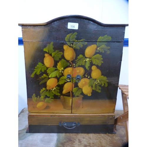 336 - Painted wall cupboard decorated with lemons and a small folding table.  (2)