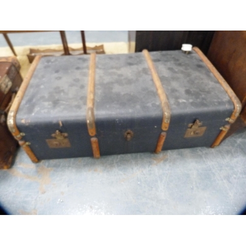 342 - Wood-bound travel trunk and a 'The Revelation' patent hide travel case.  (2)