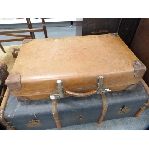 342 - Wood-bound travel trunk and a 'The Revelation' patent hide travel case.  (2)