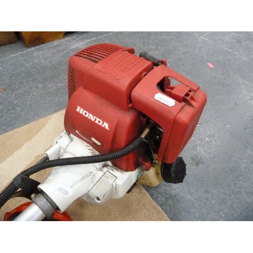 357 - Honda petrol strimmer and accessories.