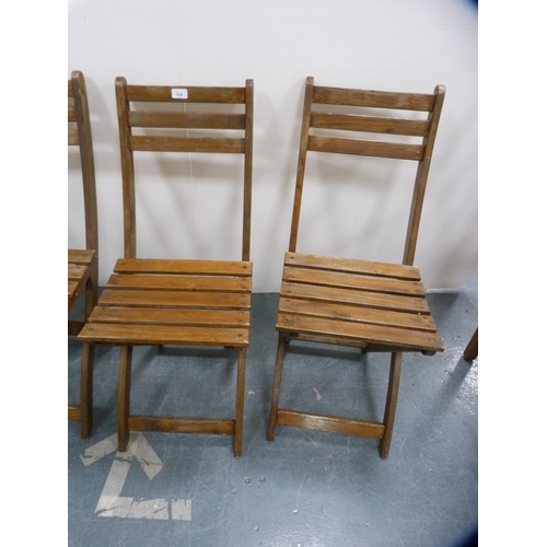 368 - Set of four wooden folding garden chairs.  (4)