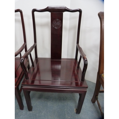 373 - Pair of Chinese-style hardwood open armchairs.