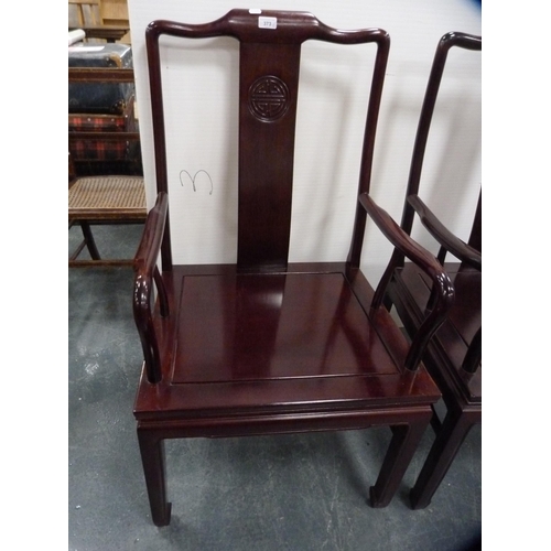 373 - Pair of Chinese-style hardwood open armchairs.