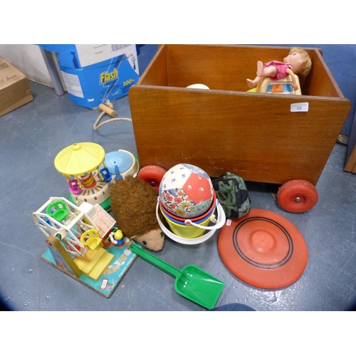 38 - Wooden pull-along child's trolley containing toys etc.