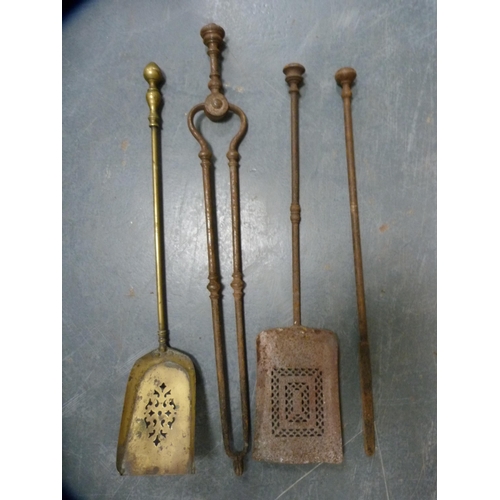 396 - Brass fire curb and assorted brass and iron fire implements.