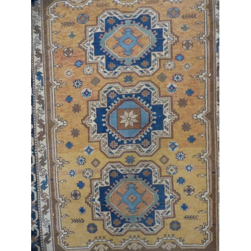 412 - Turkish hand-knotted rug on multi-coloured ground.