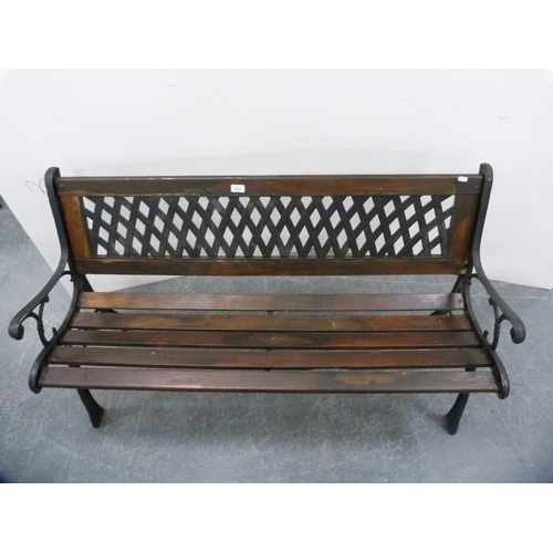 414 - Painted metal garden bench with wooden slats.