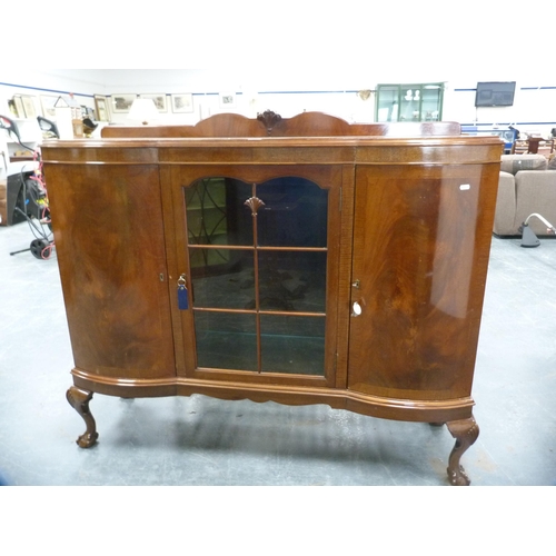 425 - Mahogany display cabinet flanked by two panel door cupboards on cabriole supports.