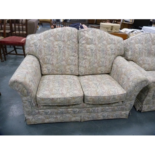 426 - Two-seat sofa and a matching armchair.