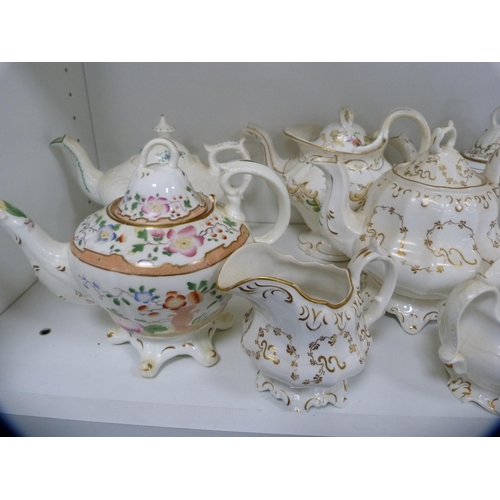 61 - Collection of Victorian teapots and cream jugs (one shelf).