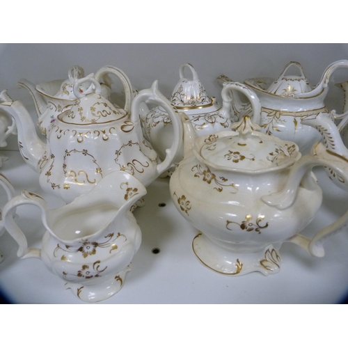 61 - Collection of Victorian teapots and cream jugs (one shelf).