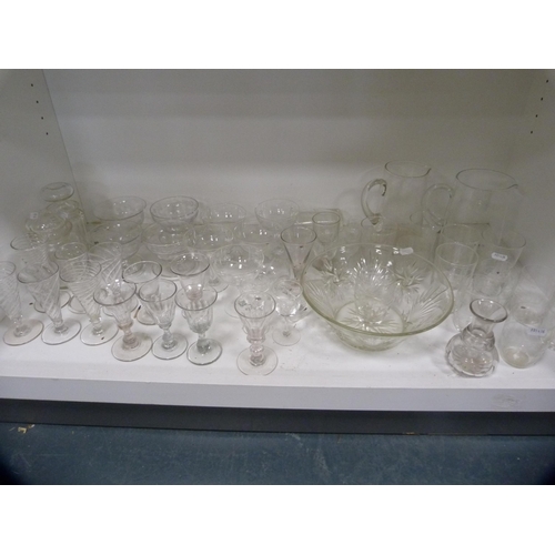 63 - Collection of glassware including spiral glasses, jugs, bowl, dishes etc (one shelf).