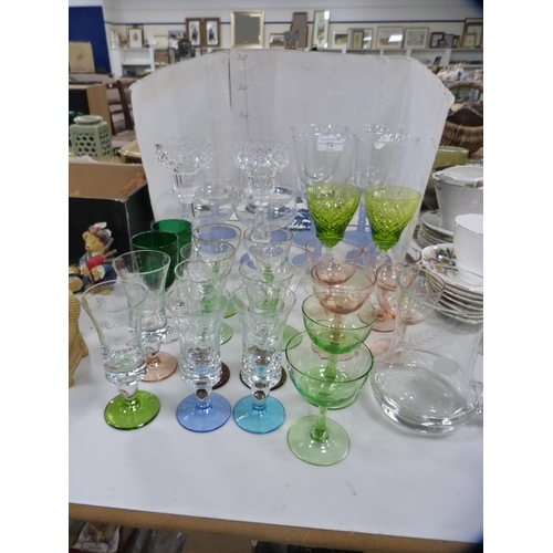 79 - Collection of various drinking glasses, a pair of candlesticks, jug etc.