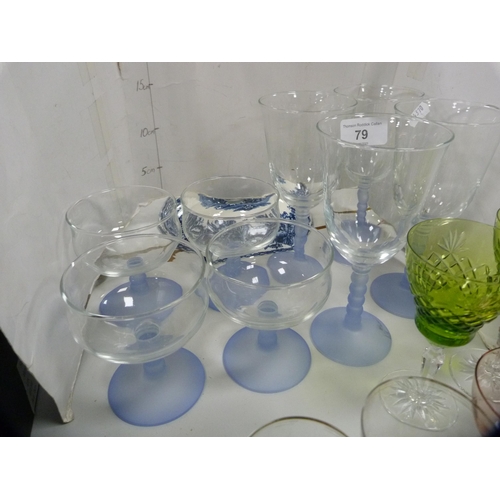 79 - Collection of various drinking glasses, a pair of candlesticks, jug etc.