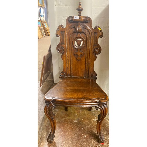 494 - Carved oak hall chair 