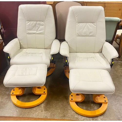 530 - Pair of cream leather swivel chairs & stools 