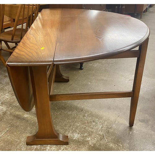 496 - Ecrol drop leaf table ,6 chairs & dresser