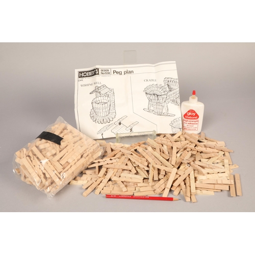 382 - Large box of pegs of modelling