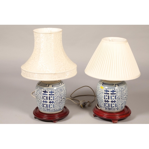 472 - Pair of blue & white table lamps & shades