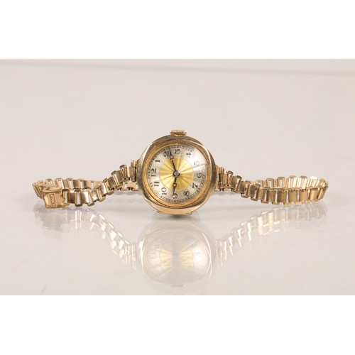91 - Ladies 9 carat gold wrist watch with rolled gold strap