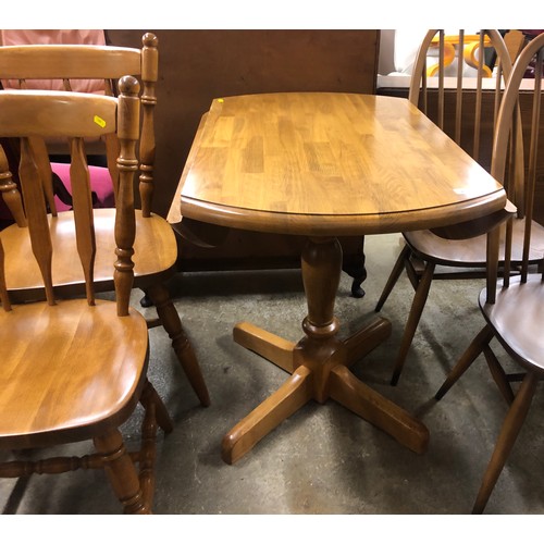 497 - Pine drop leaf kitchen table & 4 chairs 