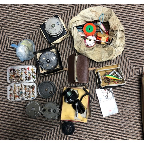 195 - Two fishing rods, reels and fishing bag etc