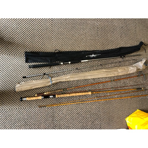 195 - Two fishing rods, reels and fishing bag etc