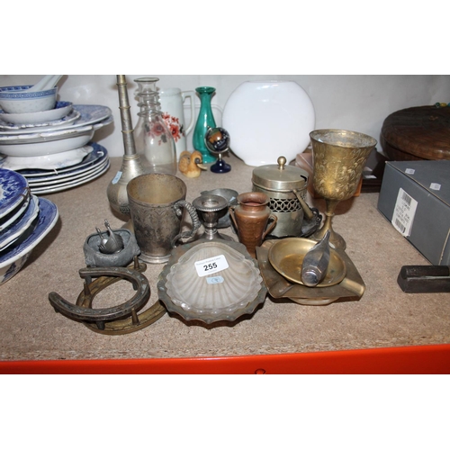 255 - Brass horseshoes, an ashtray, a pewter miniature quaich, a boat, etc.