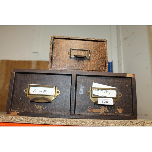 308 - Three retro filling drawers filled with loose stamps.