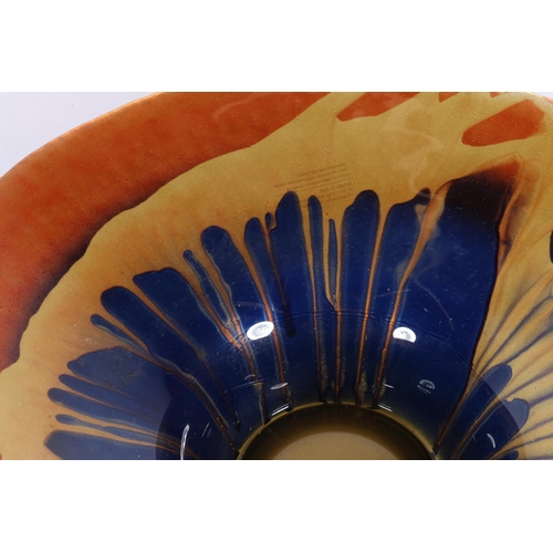 19 - Art Glass flared bowl in shades of cobalt blue and orange.