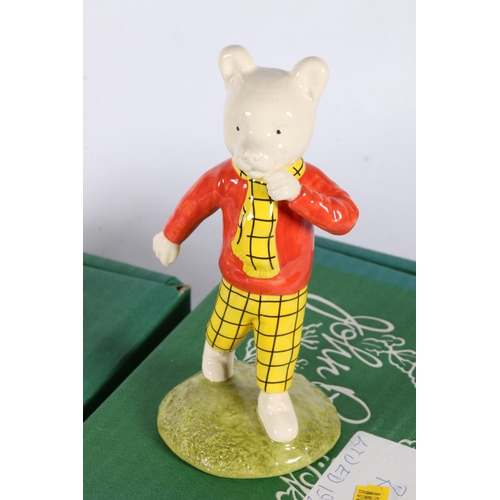 42 - Beswick Rupert the Bear and Podgy Pig figurines, with certificate and original boxes.