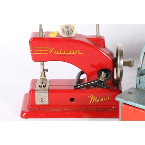 55 - Codeg children's till, a Vulcan miniature sewing machine, and a boiler.