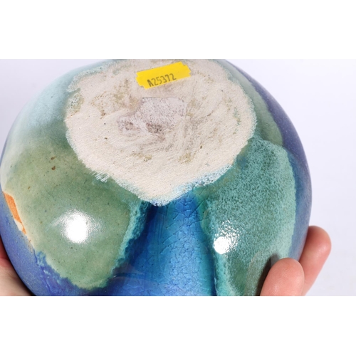 60 - Blue glazed Art Pottery sphere, and another similar.