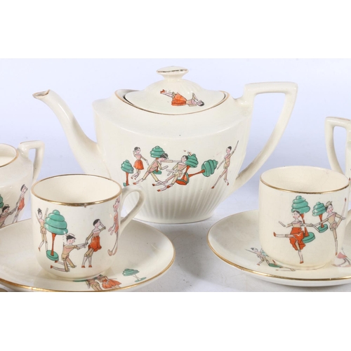 7 - Part nursery teaset, and a Royal Doulton figurine, Melanie.